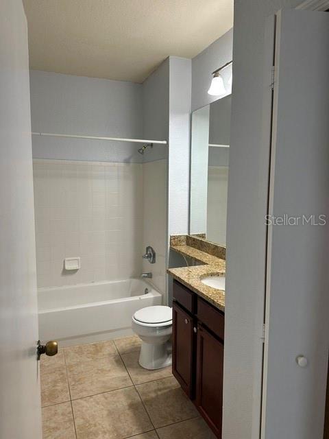 An empty bedroom features light gray walls, dark wood-look flooring, and a ceiling fan — 126 VISTA VERDI CIRCLE UNIT 204, LAKE MARY, FL