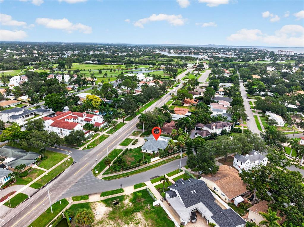 An aerial view shows a residential neighborhood with a red location pin over a house — 201 SNELL ISLE BOULEVARD NE, ST PETERSBURG, FL