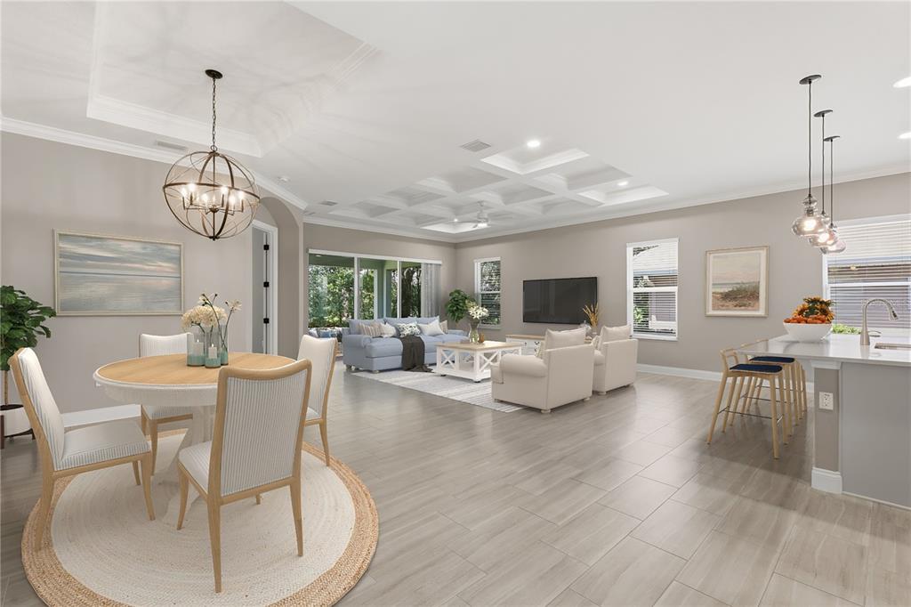 This rendering shows an open-concept living and dining area with a coffered ceiling and tile floors — 7 OASIS CIRCLE, PALM COAST, FL