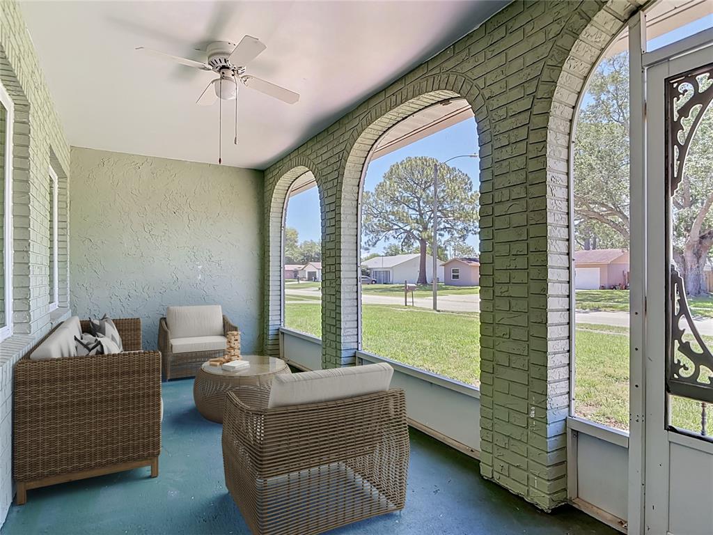 An aerial view shows a house with a screened-in pool and a fenced backyard — 1237 JEFFERY DRIVE, PORT ORANGE, FL