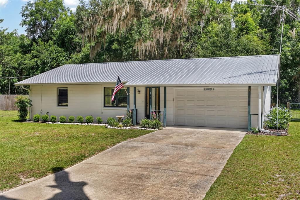 104 WOODCREST AVENUE, SATSUMA, FL — photo 3 of 30