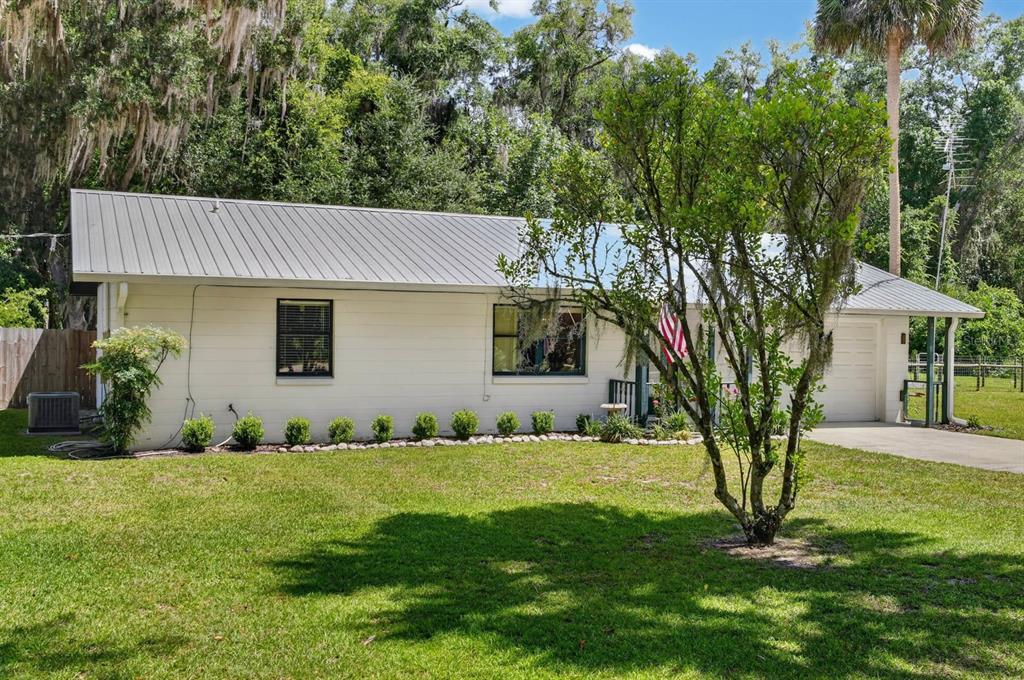 104 WOODCREST AVENUE, SATSUMA, FL — photo 4 of 30