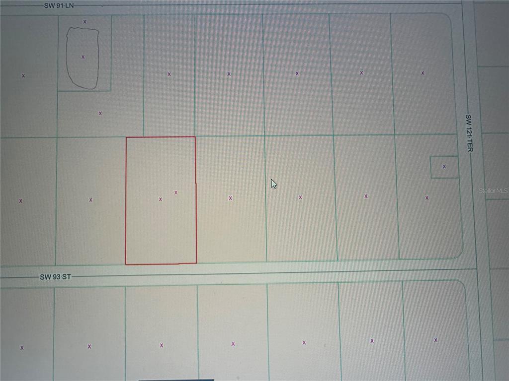 This is a map showing a rectangular parcel of land highlighted in red — SW 93RD STREET, DUNNELLON, FL