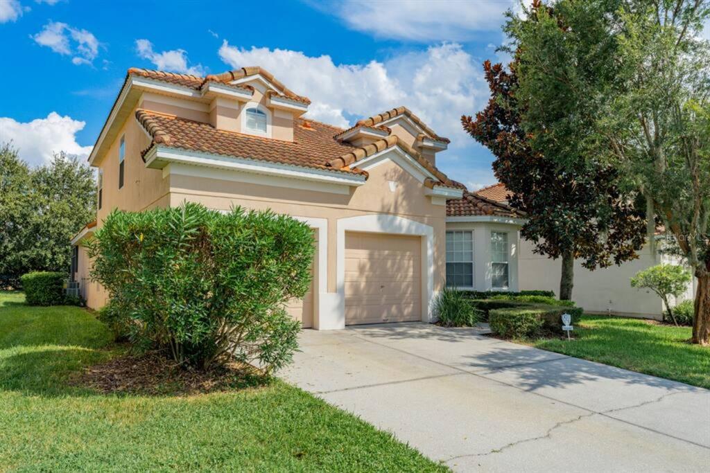 7769 TEASCONE BOULEVARD, KISSIMMEE, FL — photo 2 of 53