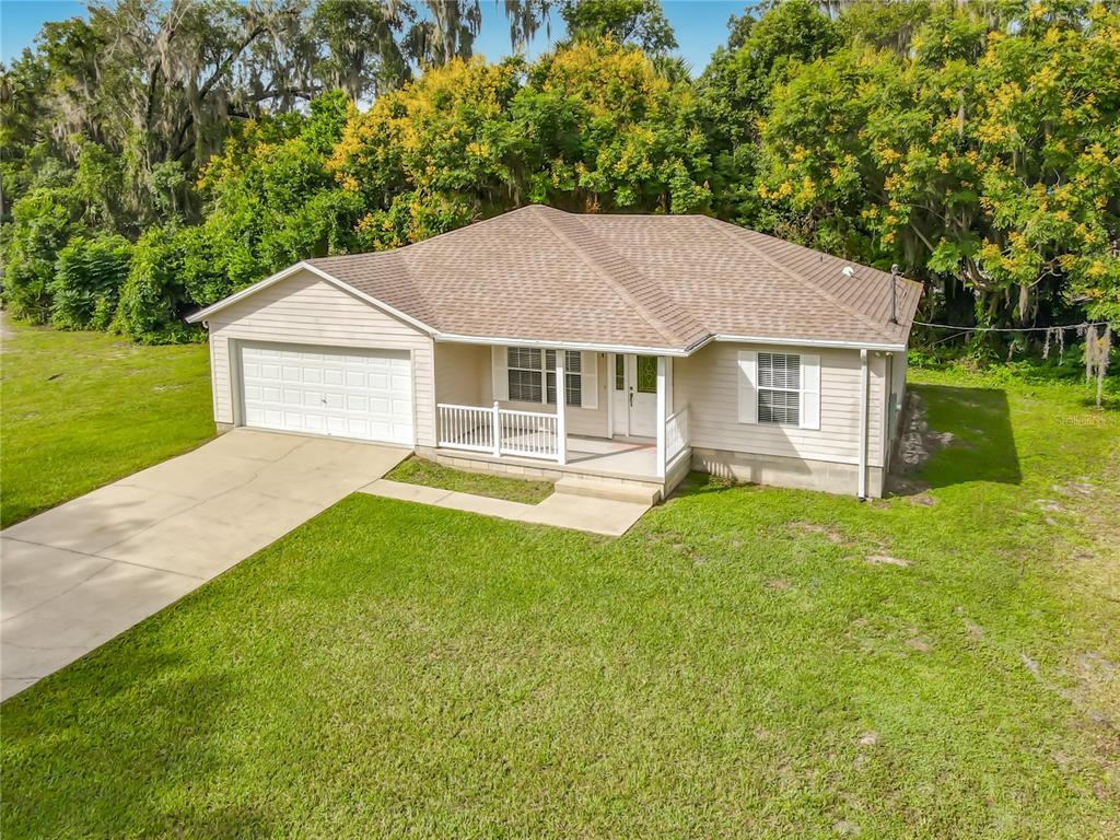 411 COLLINS COURT, ORANGE CITY, FL — photo 2 of 30
