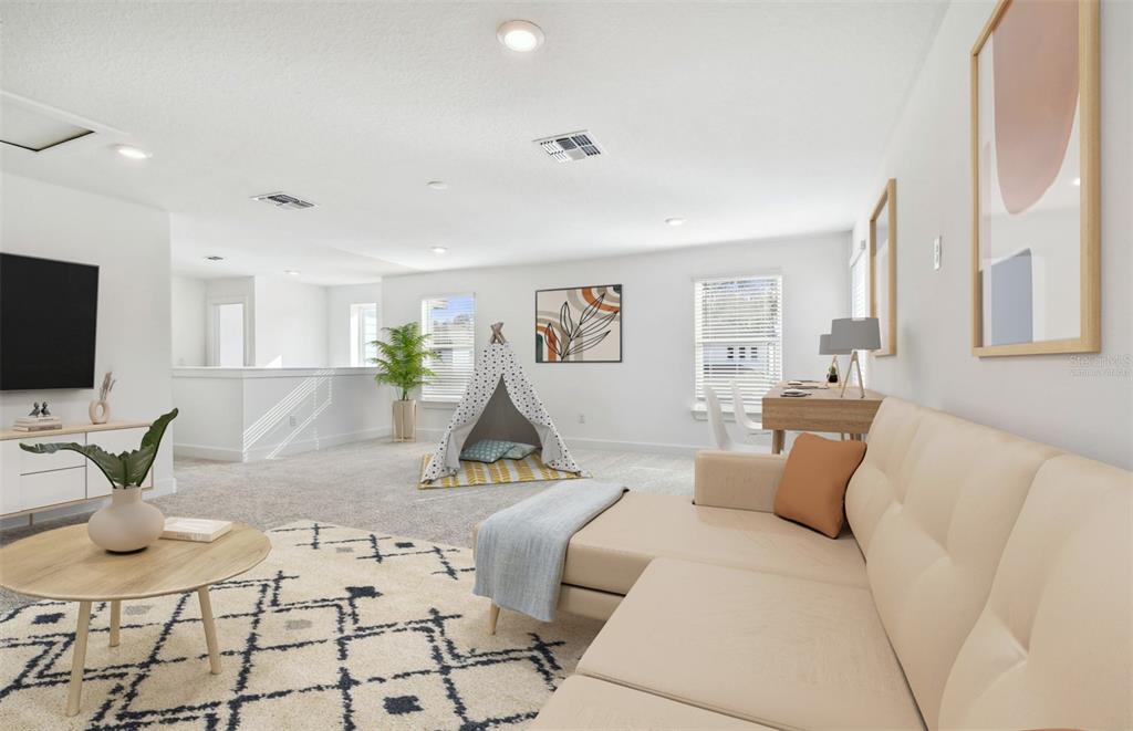 This is a virtual staging rendering of a bright, carpeted loft with a sofa and teepee — 9944 JOHNSON OAKS GLEN, PARRISH, FL