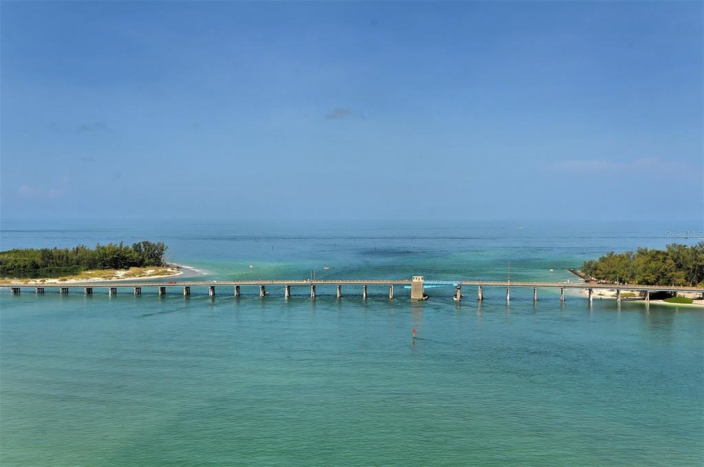 An aerial view of a bridge spanning a body of water between two islands — 8001 W 20TH PLACE, BRADENTON, FL