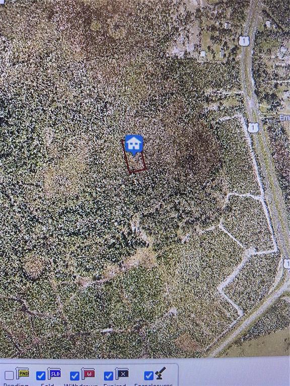 This is a satellite map view showing a rectangular property lot outlined in red — SHORT PARCEL 2003055, MIMS, FL