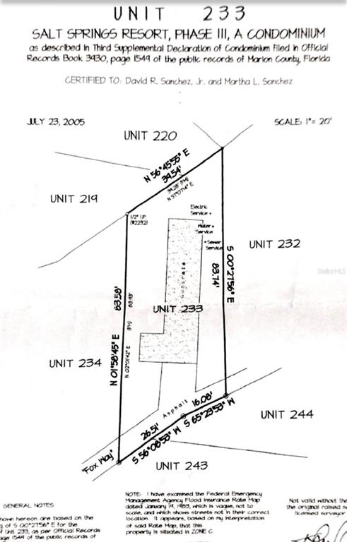 This is a survey map showing the property boundaries and dimensions for Unit 233 — 25205 NE 142 ND STREET, SALT SPRINGS, FL