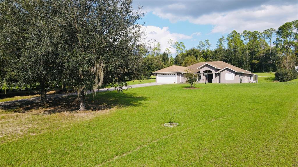8750 TEACHER LANE, ZEPHYRHILLS, FL — photo 2 of 48