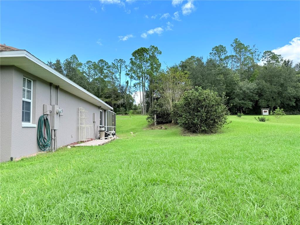 8750 TEACHER LANE, ZEPHYRHILLS, FL — photo 4 of 48