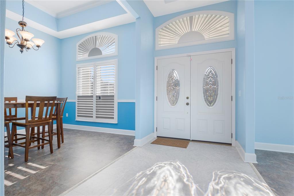 A single-story house with a blue metal roof sits on a large grassy lot — 254 SW NIGHTSHADE DRIVE, LAKE CITY, FL
