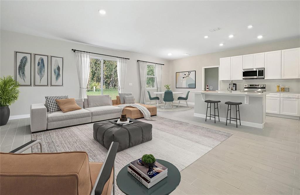 This is a digital rendering of an open-concept living room and kitchen with neutral finishes — 5454 RHAPSODY AVENUE, NORTH PORT, FL