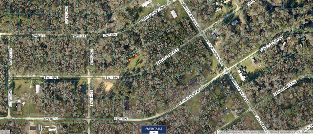 This is an aerial map showing wooded residential lots and street layouts in a neighborhood — 00 SW 14TH STREET, OCALA, FL