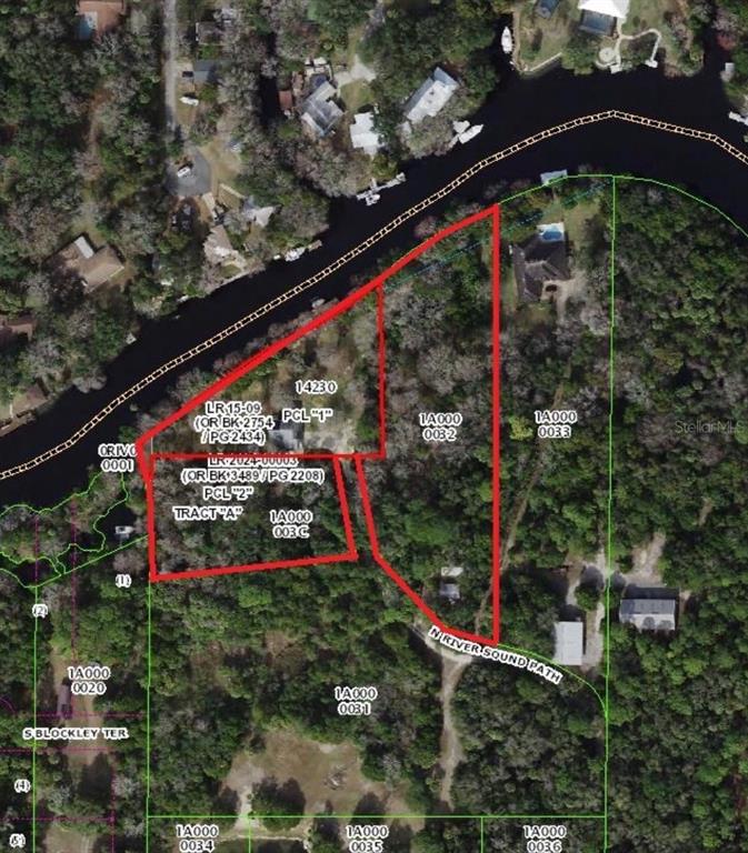 This is an aerial map showing property boundaries outlined in red over a wooded waterfront area — 11772 N RIVER SOUND PATH, INGLIS, FL