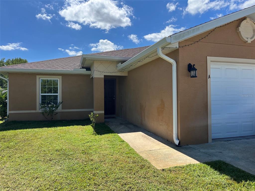 19 BUTTONBUSH LANE UNIT A, PALM COAST, FL — photo 2 of 16