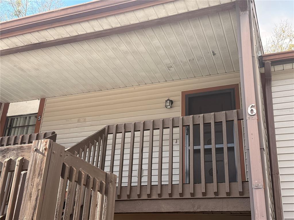 A kitchen features light wood cabinets, stainless steel appliances, and a double-basin sink — 12155 ENVIRONMENTAL DRIVE UNIT 6, NEW PORT RICHEY, FL