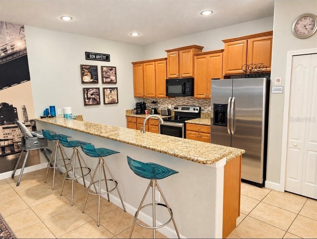 8961 BISMARCK PALM RD, KISSIMMEE, FL — photo 4 of 20