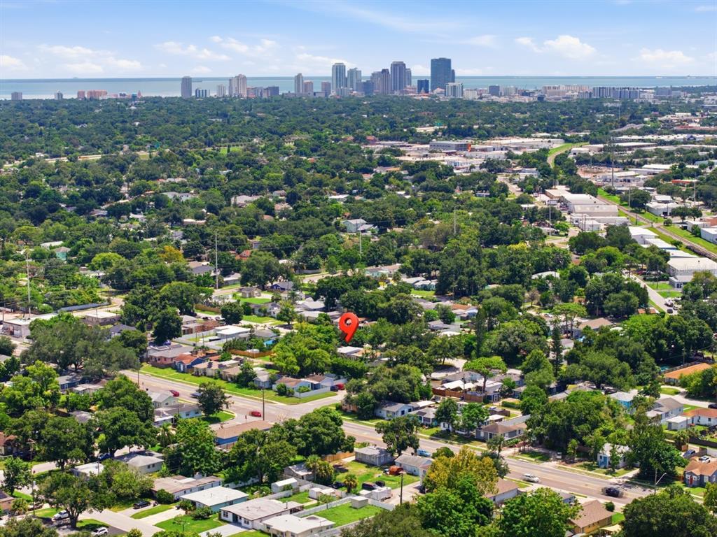 An aerial view shows a residential neighborhood with a red location pin over a house — 2855 37TH AVENUE N, ST PETERSBURG, FL