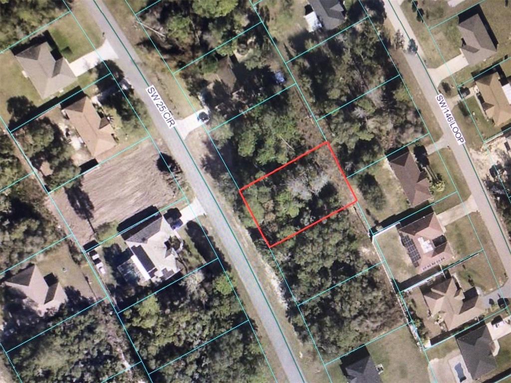 This is an aerial map view of a wooded residential lot outlined in red — 0 SW 25 CIRCLE, OCALA, FL
