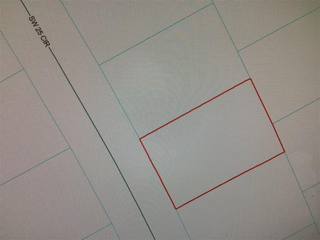 This is a map showing a rectangular property lot outlined in red near a road — 0 SW 25 CIRCLE, OCALA, FL