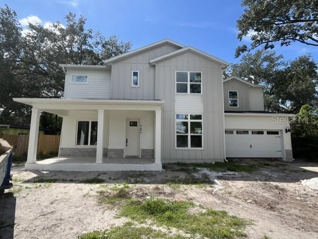 This is a floor plan showing the first level of a house with a garage — 1604 COLE ROAD, ORLANDO, FL