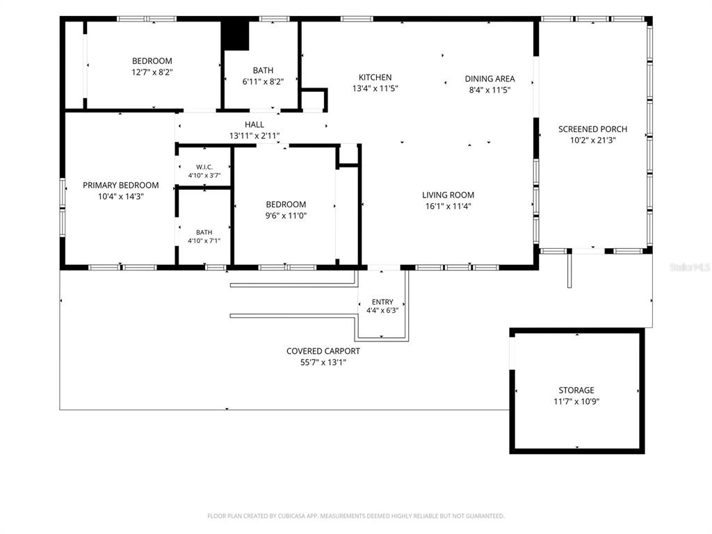 A kitchen features light wood cabinets, a central island with bar stools, and white appliances — 6806 MOUNT QUINCY DRIVE NE UNIT 361, ST PETERSBURG, FL