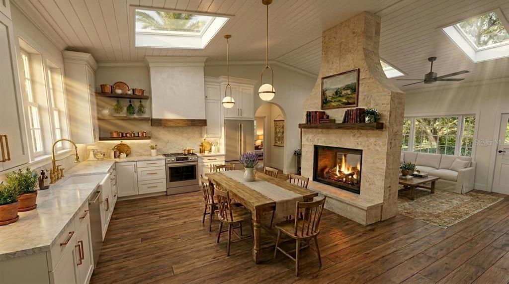 A kitchen and dining area features a stone fireplace, wooden floors, and skylights — 15580 COUNTY ROAD 675, PARRISH, FL