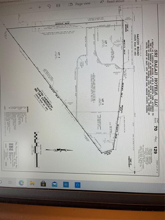 This is a land survey plat map showing three lots and their property boundaries — 1936 MCCOY ROAD, BELLE ISLE, FL