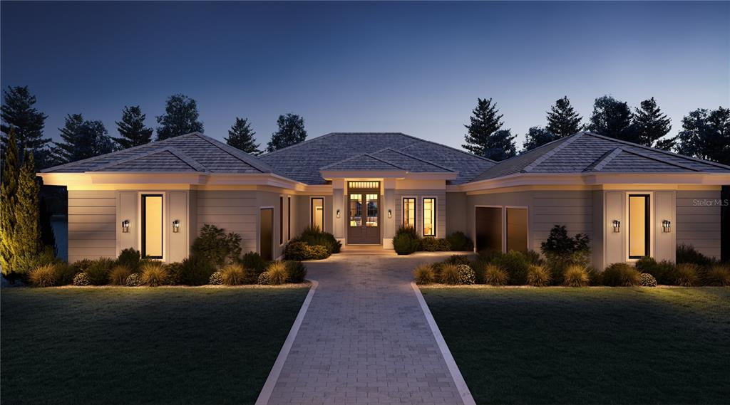 This is a digital rendering of a modern single-story house exterior at dusk — 15934 PENDIO DRIVE, MONTVERDE, FL
