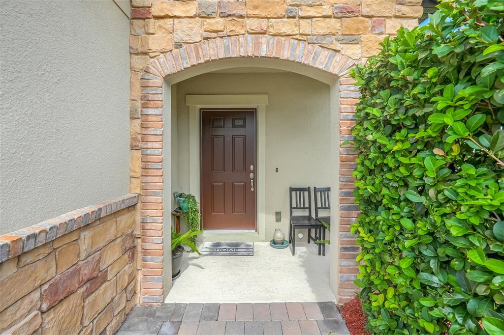 An aerial view shows two adjacent two-story suburban houses with paved driveways and lawns — 2948 CREST DRIVE, KISSIMMEE, FL