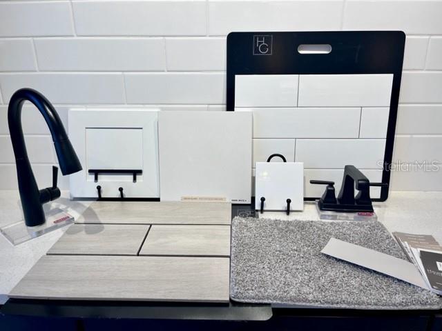 This interior design sample board displays various tile, flooring, and fixture options for a home — 741 WEKIVA RIDGE DRIVE, MOUNT DORA, FL