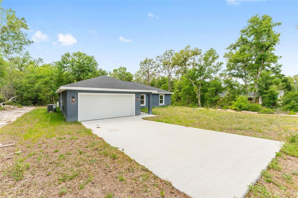 10374 SE 126TH LANE, BELLEVIEW, FL — photo 2 of 30