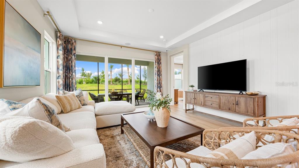 This image displays a design selection board for home finishes including flooring, tile, countertops, and cabinetry — 13344 SANTINI CIRCLE, ENGLEWOOD, FL