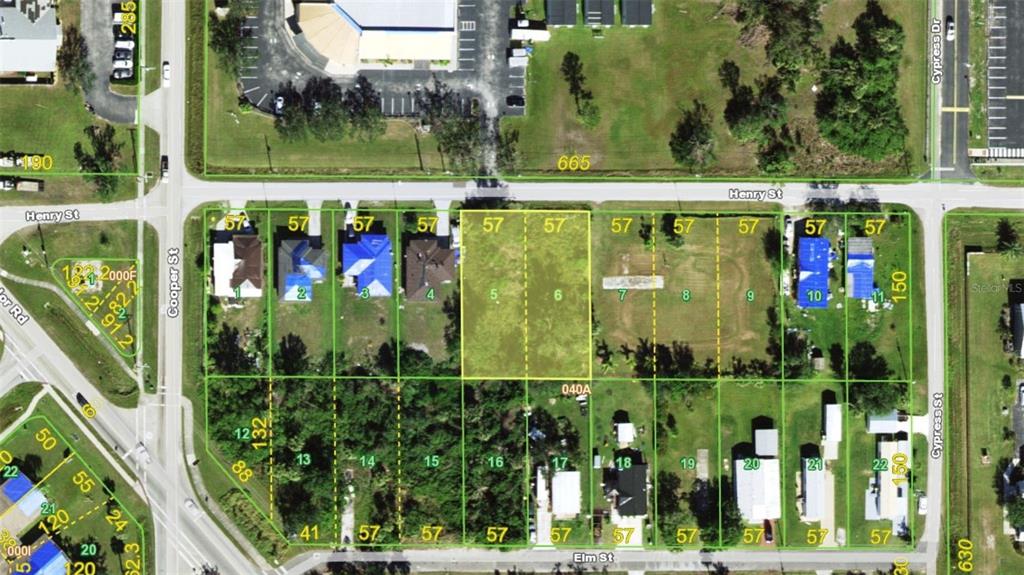This is an aerial map showing a residential block with numbered lots and street names — 933 HENRY STREET, PUNTA GORDA, FL