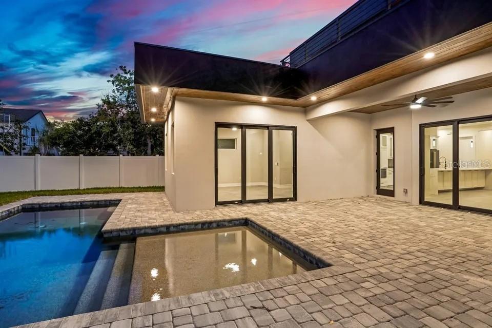 This is a two-story floor plan showing the layout of rooms, garage, and balcony — 2475 BAY STREET, SARASOTA, FL