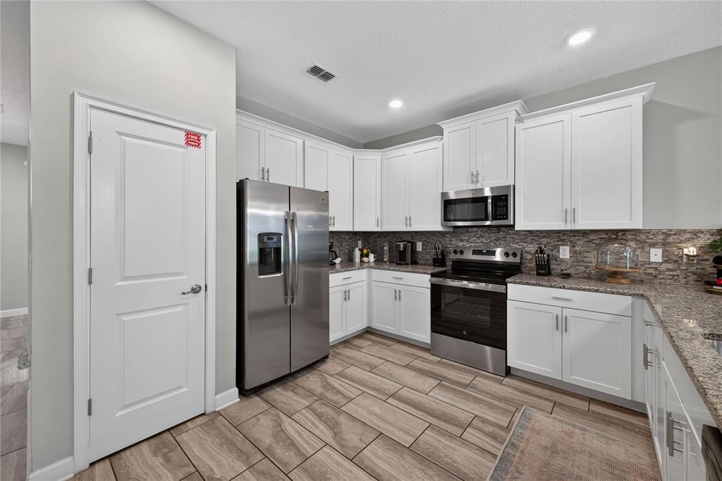 9016 STINGER DRIVE, CHAMPIONS GATE, FL — photo 3 of 30