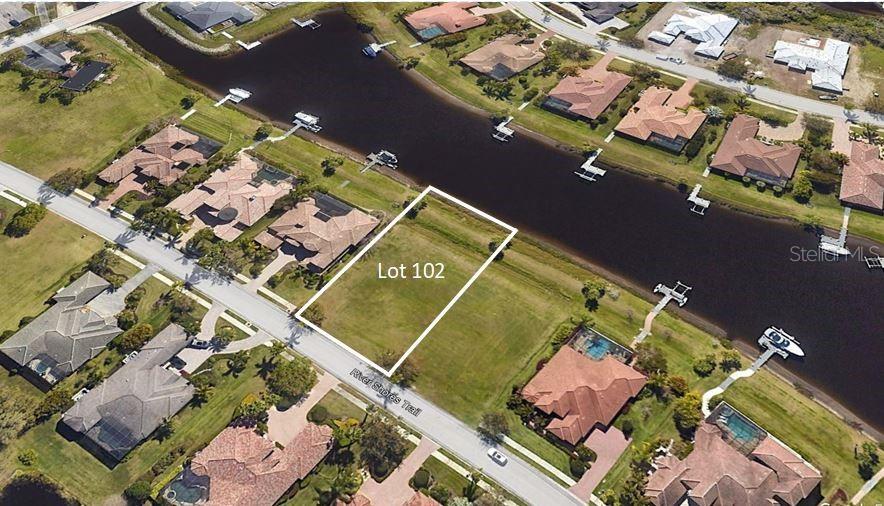 This aerial map shows a vacant waterfront lot labeled 102 along a residential street — 11815 RIVER SHORES TRAIL, PARRISH, FL