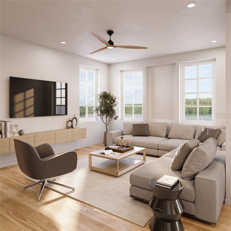 This is a rendering of a modern living room featuring a sectional sofa and television — 8517 KARRER TERRACE, ORLANDO, FL