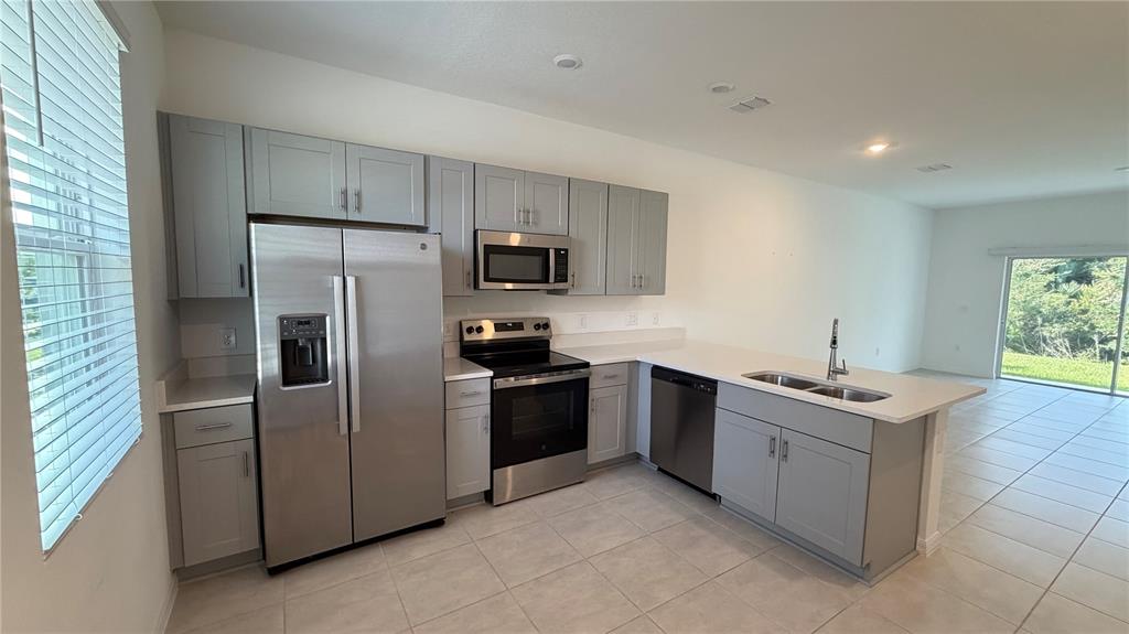 3119 SKYLINE LOOP, POINCIANA, FL — photo 3 of 26