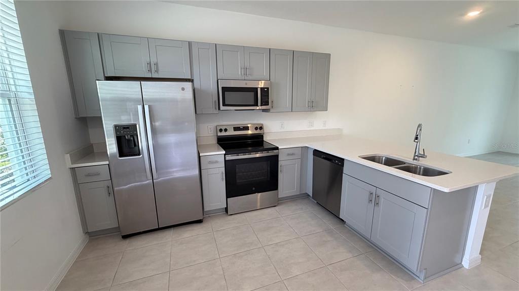 3119 SKYLINE LOOP, POINCIANA, FL — photo 4 of 26