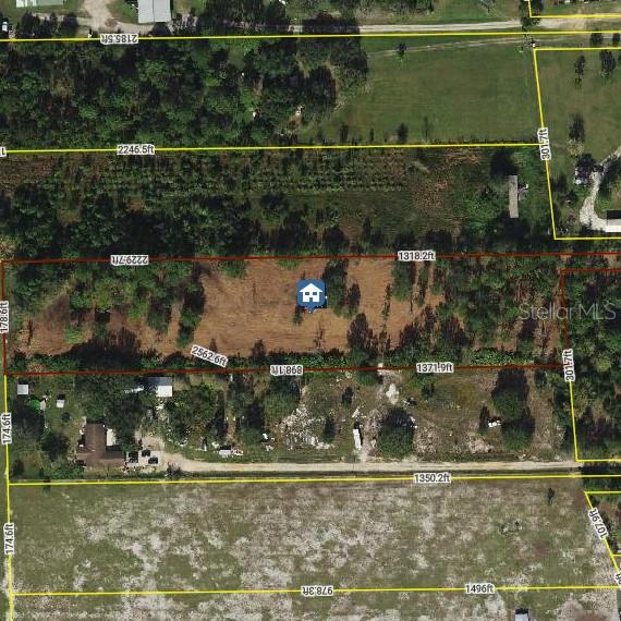 A view of a cleared, grassy lot with scattered trees under an overcast sky — 0 WEST FROSTPROOF ROAD, FROSTPROOF, FL