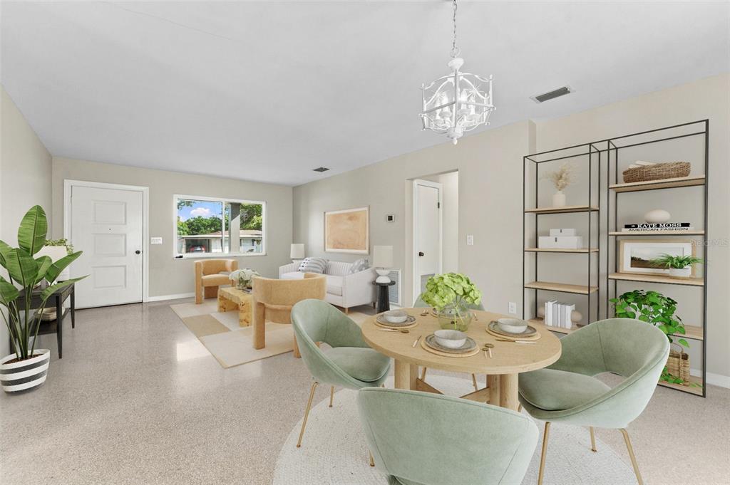 A bright, open-concept living and dining area features light-colored walls, terrazzo flooring, and modern furniture — 2116 W MINNEHAHA STREET, TAMPA, FL