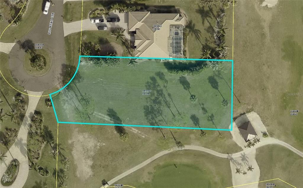 This is an aerial map showing a vacant residential lot outlined in blue — 3000 BIG BEND CIRCLE, PUNTA GORDA, FL