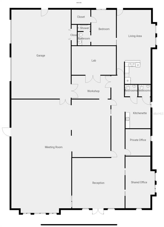 This is a floor plan for a building featuring a garage, workshop, meeting room, and offices — 2605 BAYVIEW STREET, SEBRING, FL