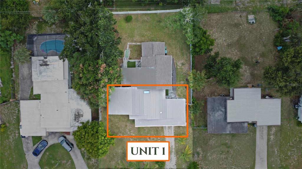 An aerial view shows a residential property with a highlighted house labeled Unit 1 — 1311 HILLCREST DRIVE, DAYTONA BEACH, FL