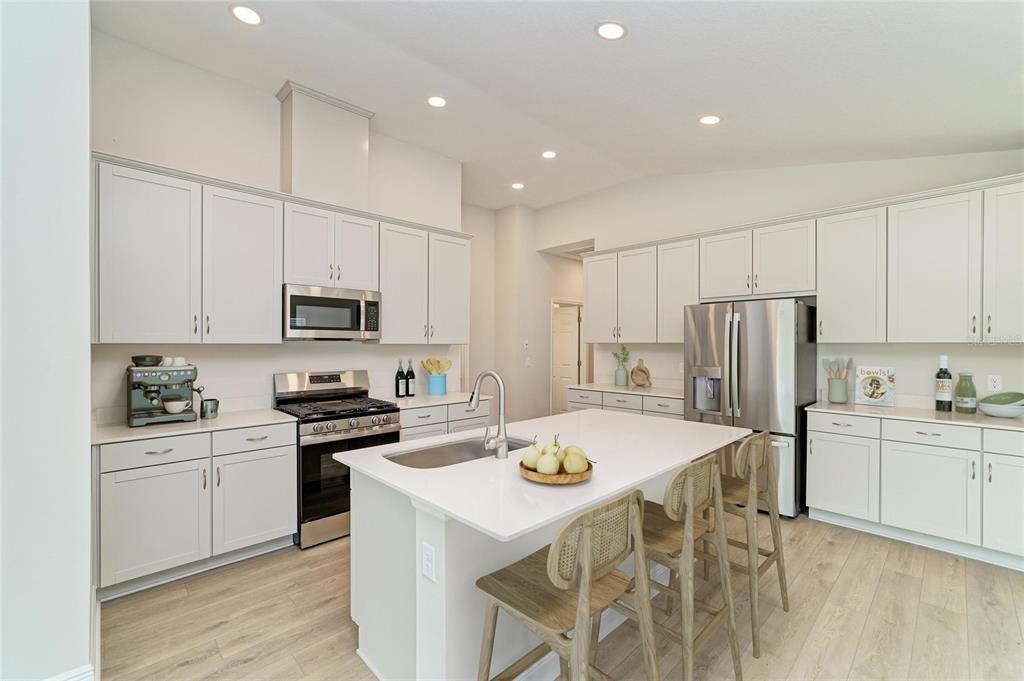 A single-story house under construction with an open garage and exposed concrete block walls — 12365 OAK  HILL WAY, PARRISH, FL