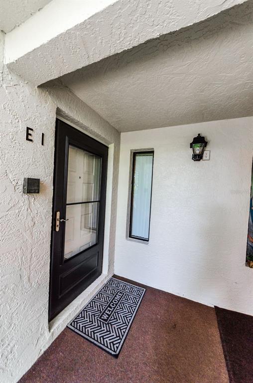 2575 PINE RIDGE WAY S UNIT E1, PALM HARBOR, FL — photo 4 of 11