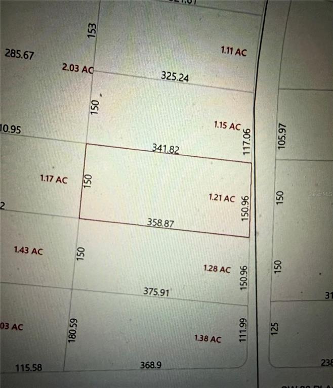 This is a land survey map showing the dimensions and acreage of several adjacent lots — SW 205TH CIRCLE, DUNNELLON, FL