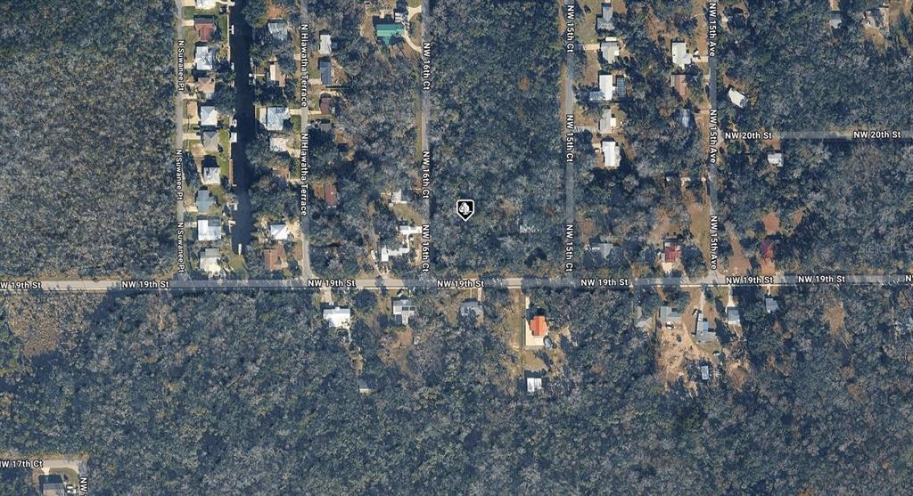 This is an aerial map view showing residential streets, wooded lots, and houses — 1915 NW 16TH COURT, CRYSTAL RIVER, FL